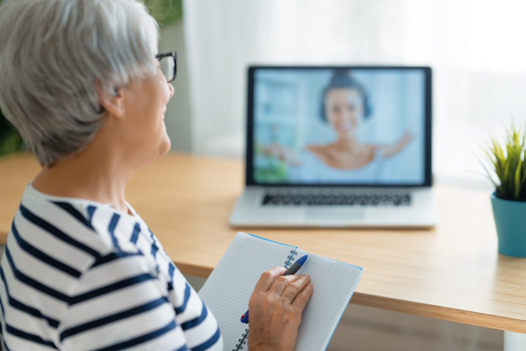 senior woman is using laptop 2021 08 29 17 34 35 utc scaled 1